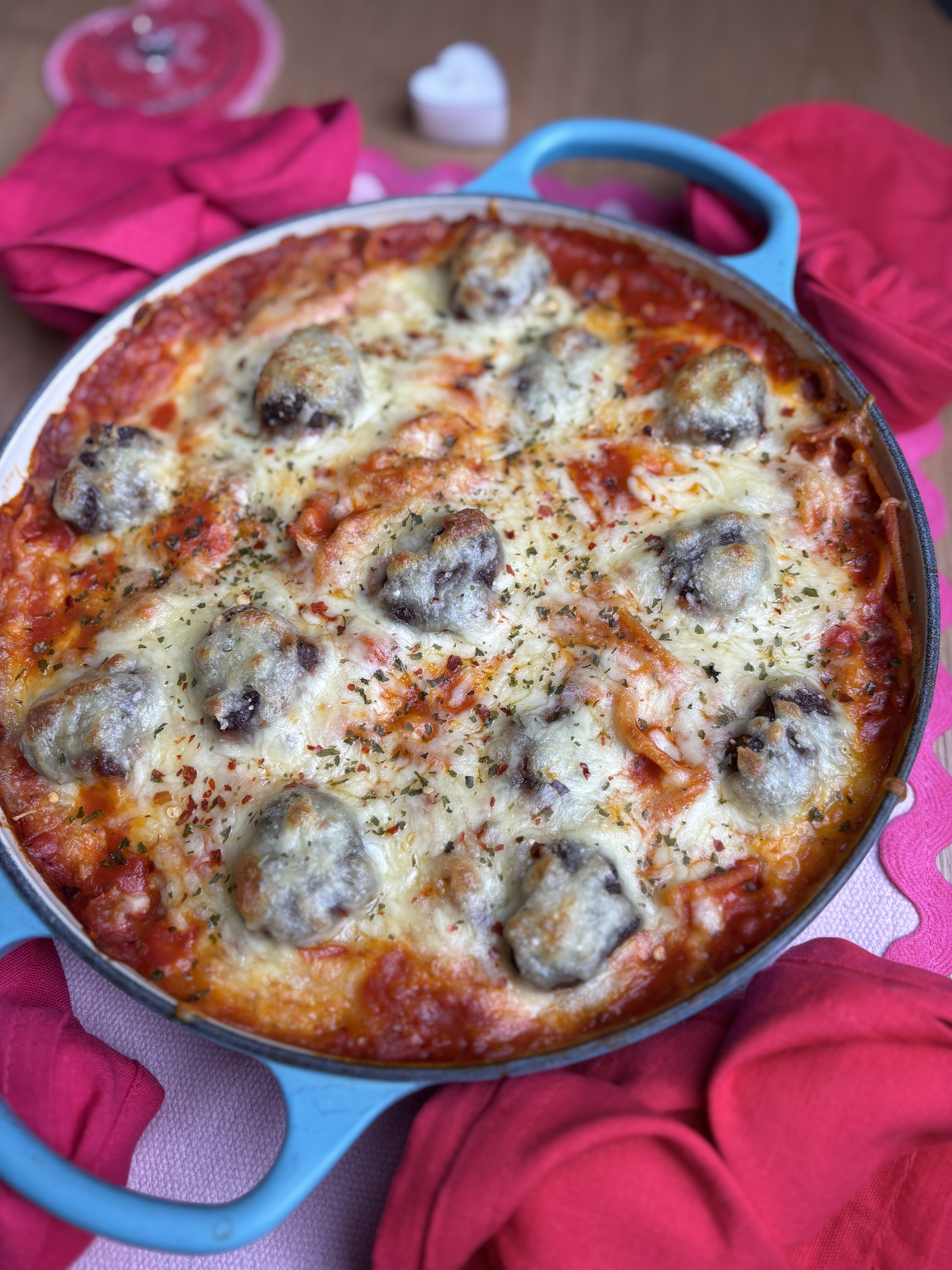 Cheesy stuffed meatball bake