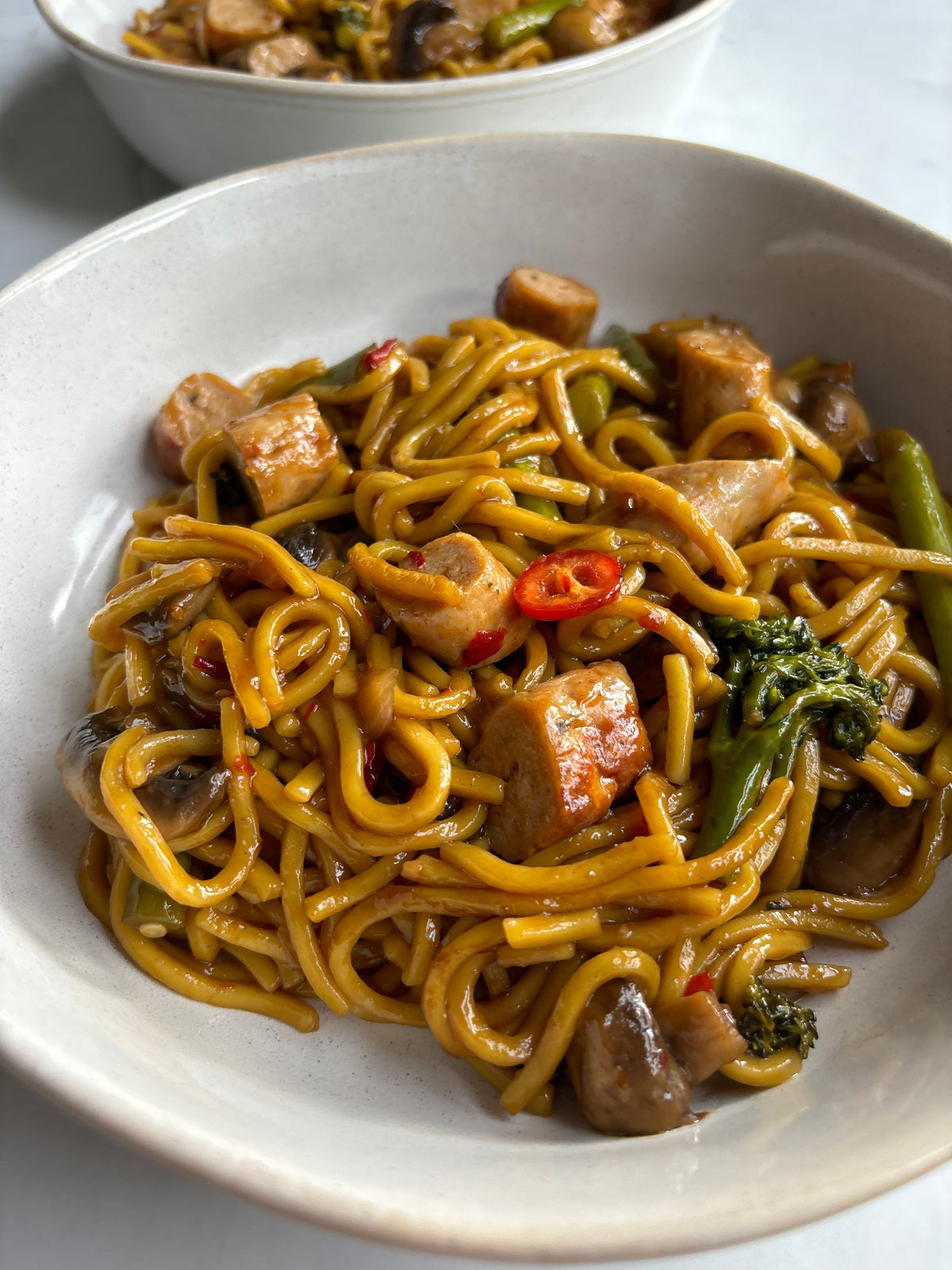 Sticky chicken sausage stir fry