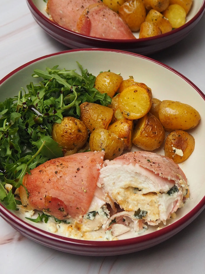 Stuffed chicken wrapped in bacon