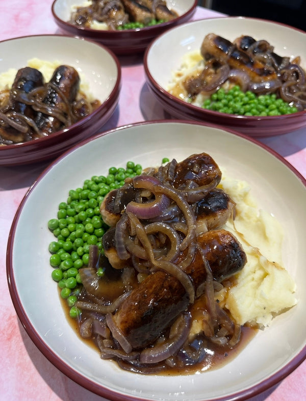 Sausage, caramelised onion gravy & mash