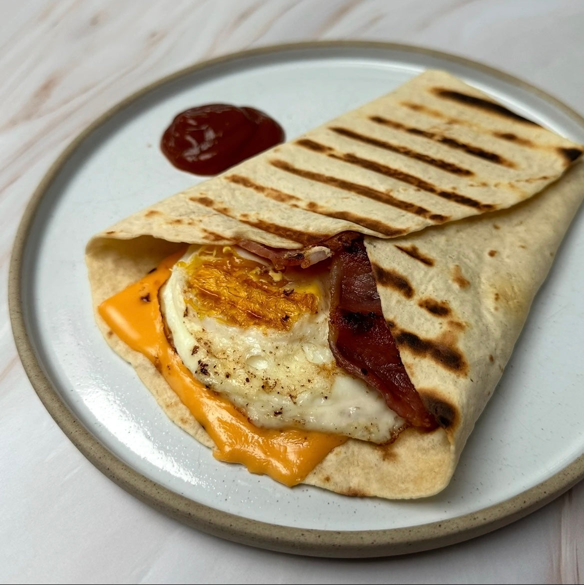 Cheesy bacon egg wrap