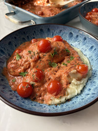 Creamy boursin & tomato traybake